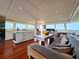 saloon with nav table and galley in background